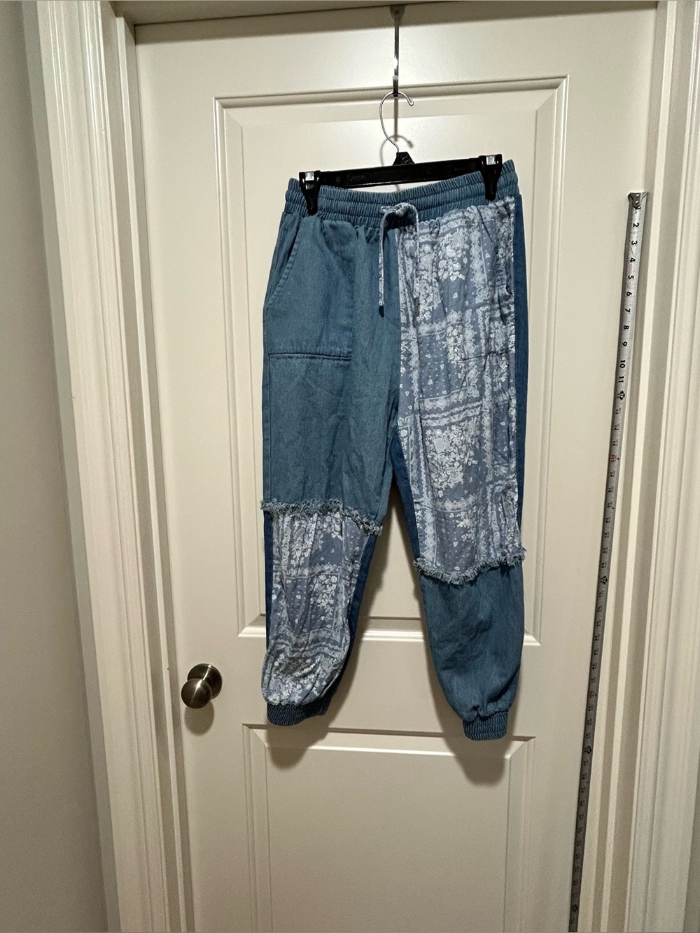 And The Why brand women’s size M Blue Patchwork Jogger Pants. Elastic waist